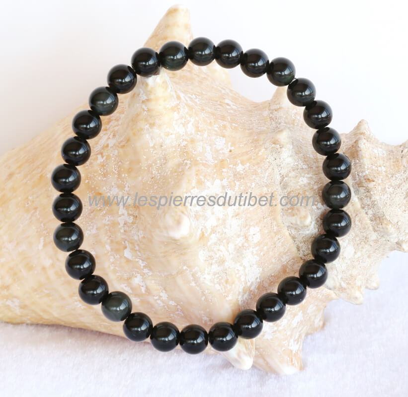 Bracelet de perles de pierre Obsidienne Oeil célèste. ​Un typique bracelet de connection magique: en effet, l'Obsidienne Oeil célèste est une pierre très puissante à la fois pour le bouclier qu'elle va offrir à son porteur, et pour les possibilités