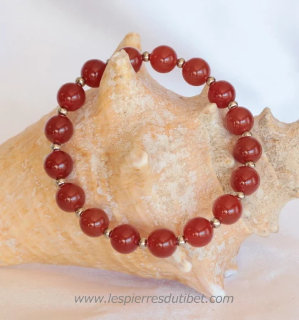 Bracelet de pierres Agate rouge composé à la main par mes soins, monté sur fil élastique bijoutier, taille des perles: 8mm, trois tailles de bracelets au choix.