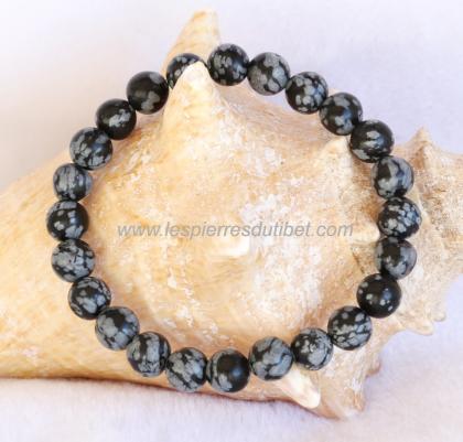 Bracelet de perles d'Obsidienne Flocon de neige (mouchetée). Unisexe. Un bracelet qui affiche une certaine puissance, car il est confectionné à partir d'une pierre majestueuse et protectrice.