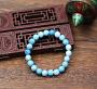 Simple bracelet de perles de pierre Larimar, une pierre recherchée pour sa couleur et ses vertus. Protectrice, son histoire s'enrichit au travers des différentes cultures et traditions.