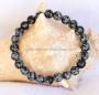 Bracelet de perles d'Obsidienne Flocon de neige (mouchetée). Unisexe. Un bracelet qui affiche une certaine puissance, car il est confectionné à partir d'une pierre majestueuse et protectrice.